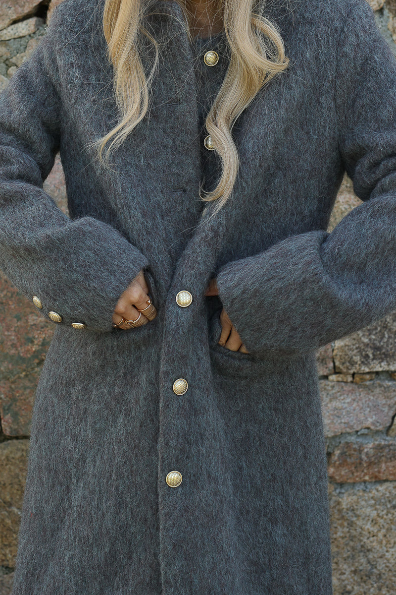 Manteau long a bouton